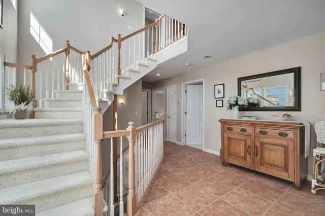 a view of an entryway with staircase