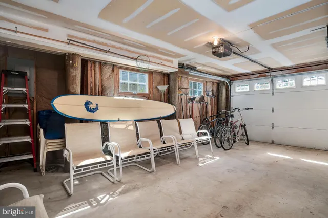 a bathroom with a shower and a sink