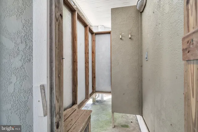 a front view of a house with a yard and outdoor seating