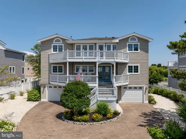 an aerial view of river residential houses with outdoor space