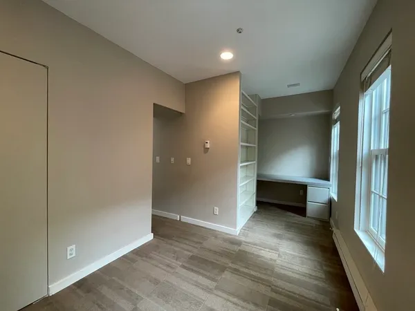 a room with furniture and windows