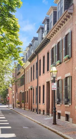 a view of a building along the street