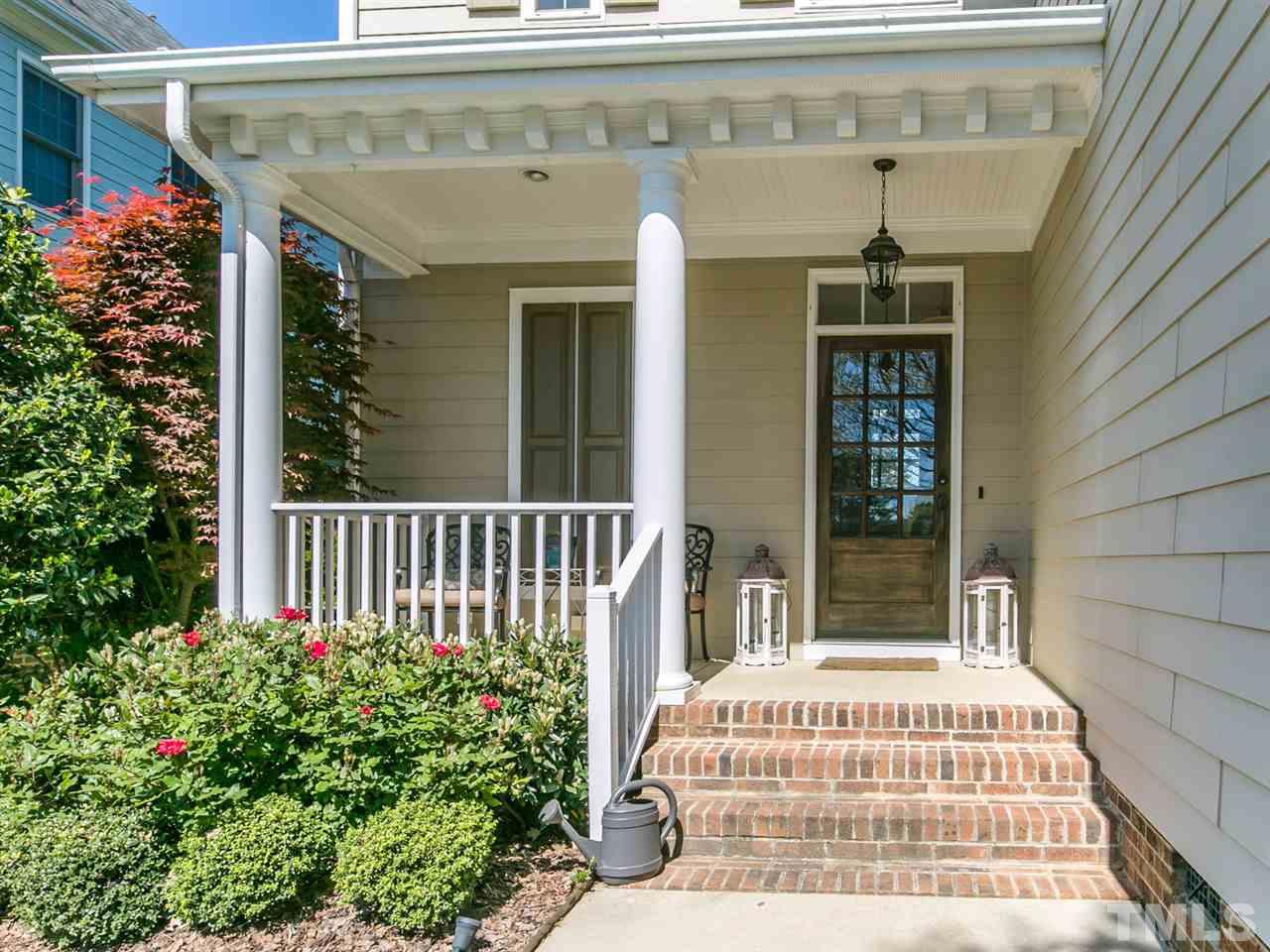1348 Ileagnes Road Raleigh, NC 27603 - Photo 2 of 25 a front view of a house with a porch