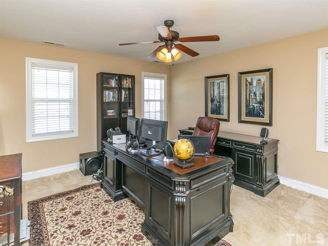 1348 Ileagnes Road Raleigh, NC 27603 - Photo 15 of 25 a living room with furniture and a window