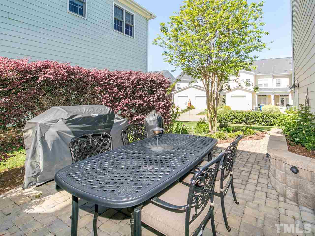 1348 Ileagnes Road Raleigh, NC 27603 - Photo 17 of 25 a view of an outside dining space with furniture