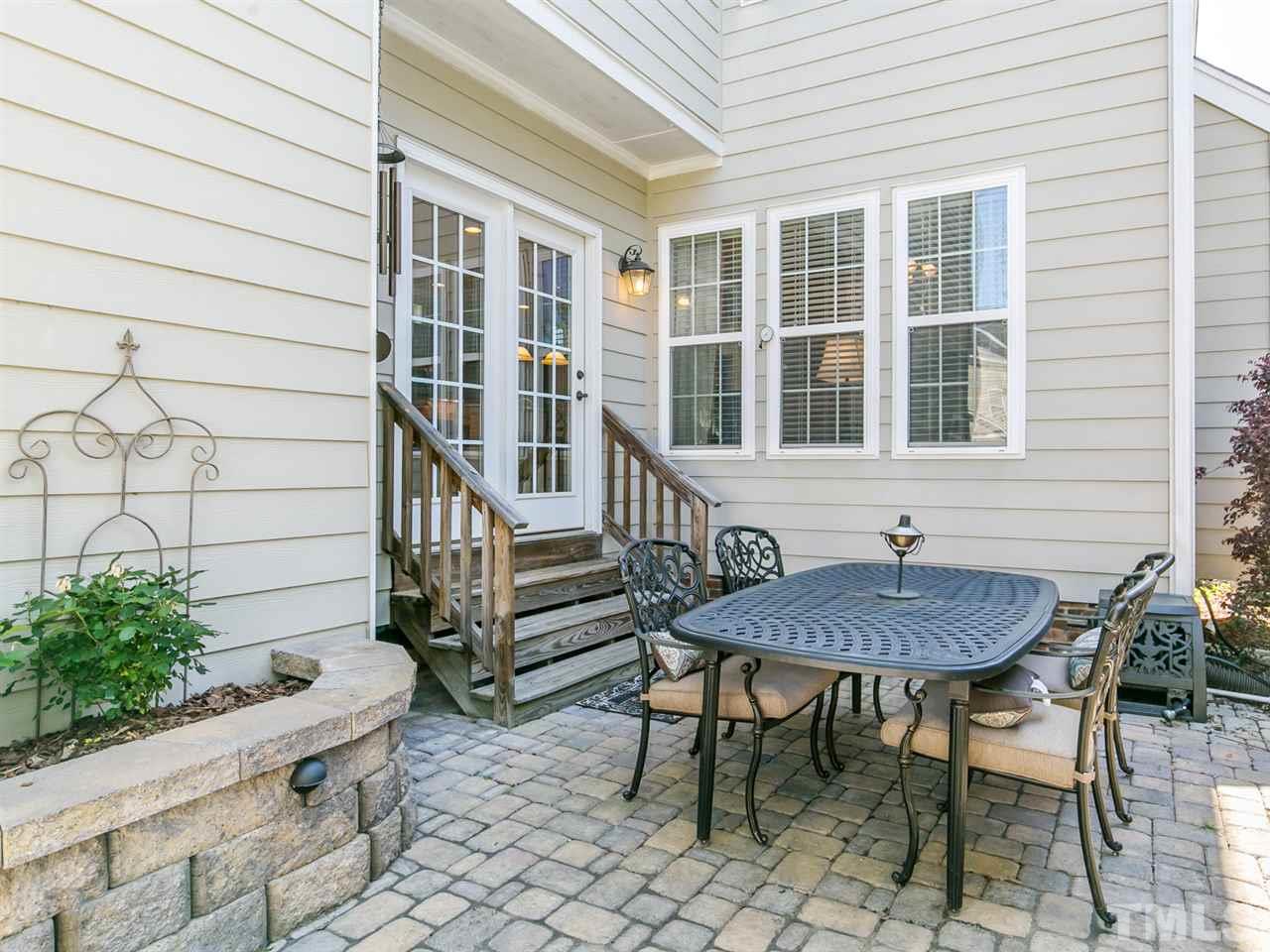 1348 Ileagnes Road Raleigh, NC 27603 - Photo 18 of 25 a view of a house with a table and chair