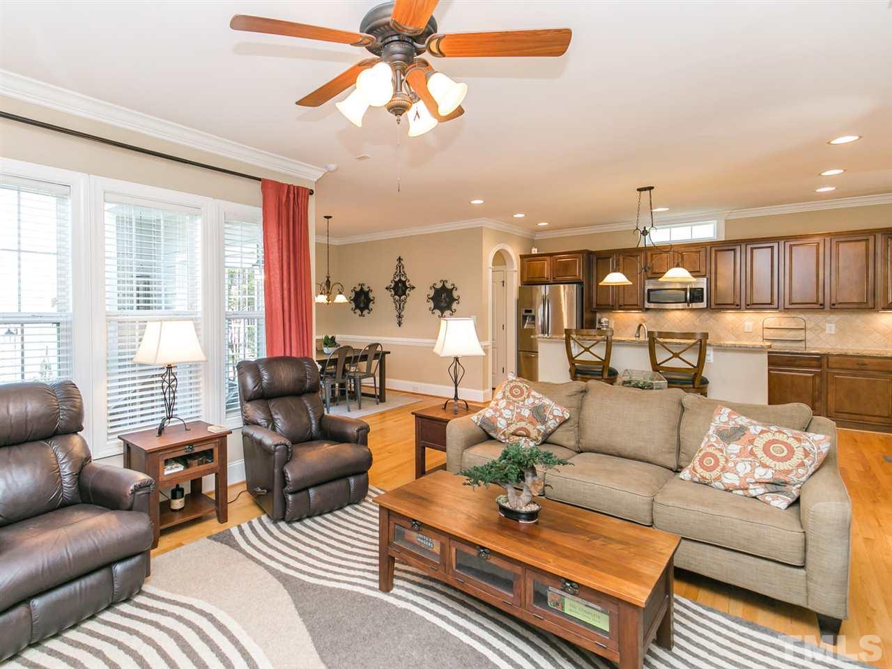 1348 Ileagnes Road Raleigh, NC 27603 - Photo 4 of 25 a living room with furniture kitchen and a large window