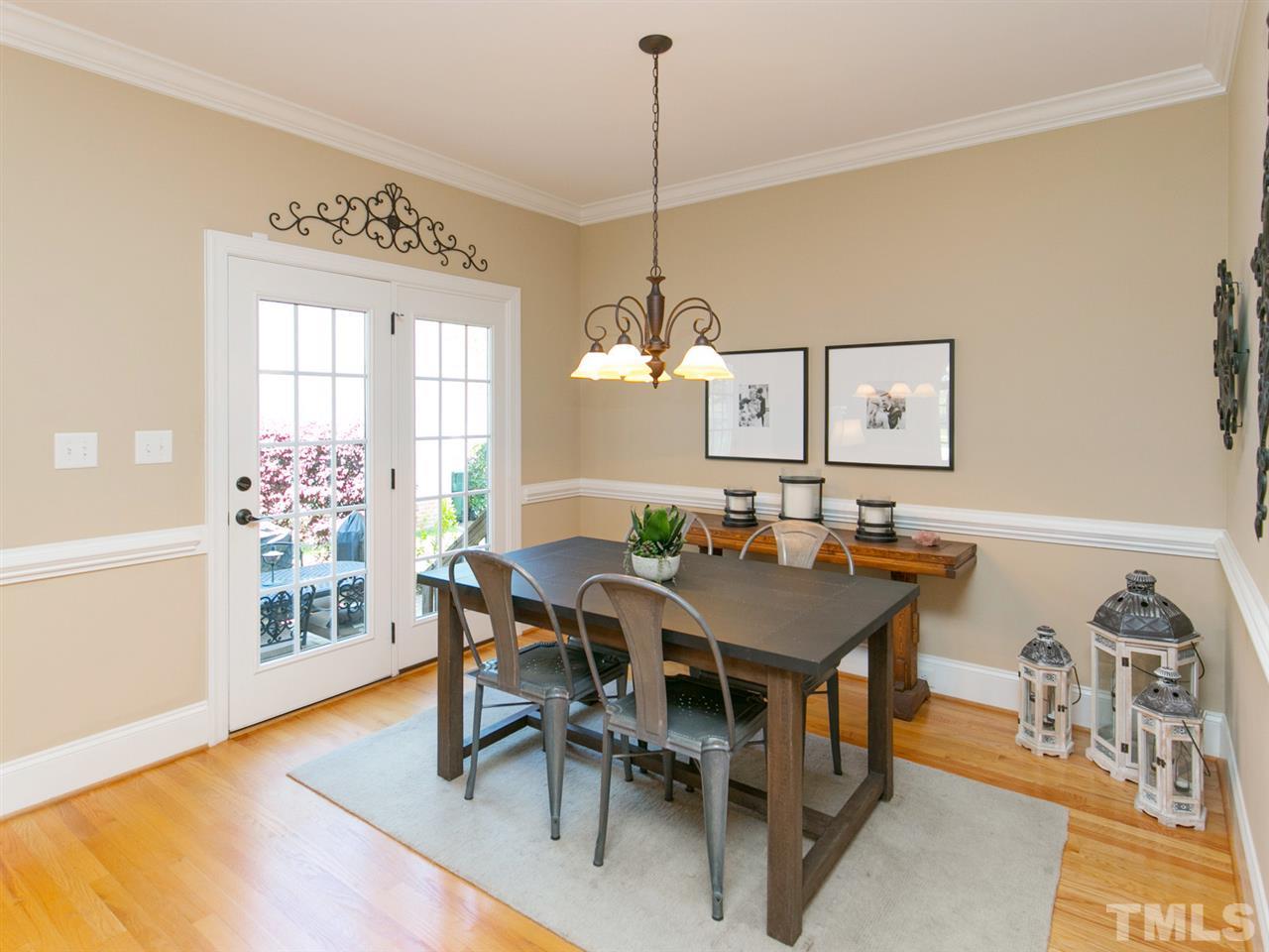 1348 Ileagnes Road Raleigh, NC 27603 - Photo 9 of 25 a view of a dining room with furniture