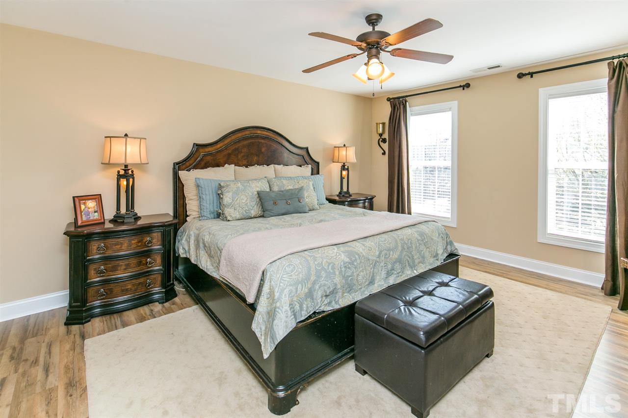 1348 Ileagnes Road Raleigh, NC 27603 - Photo 10 of 25 a bedroom with a bed dresser and a window