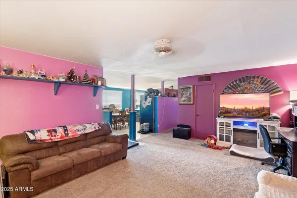 a bedroom with furniture and a bed