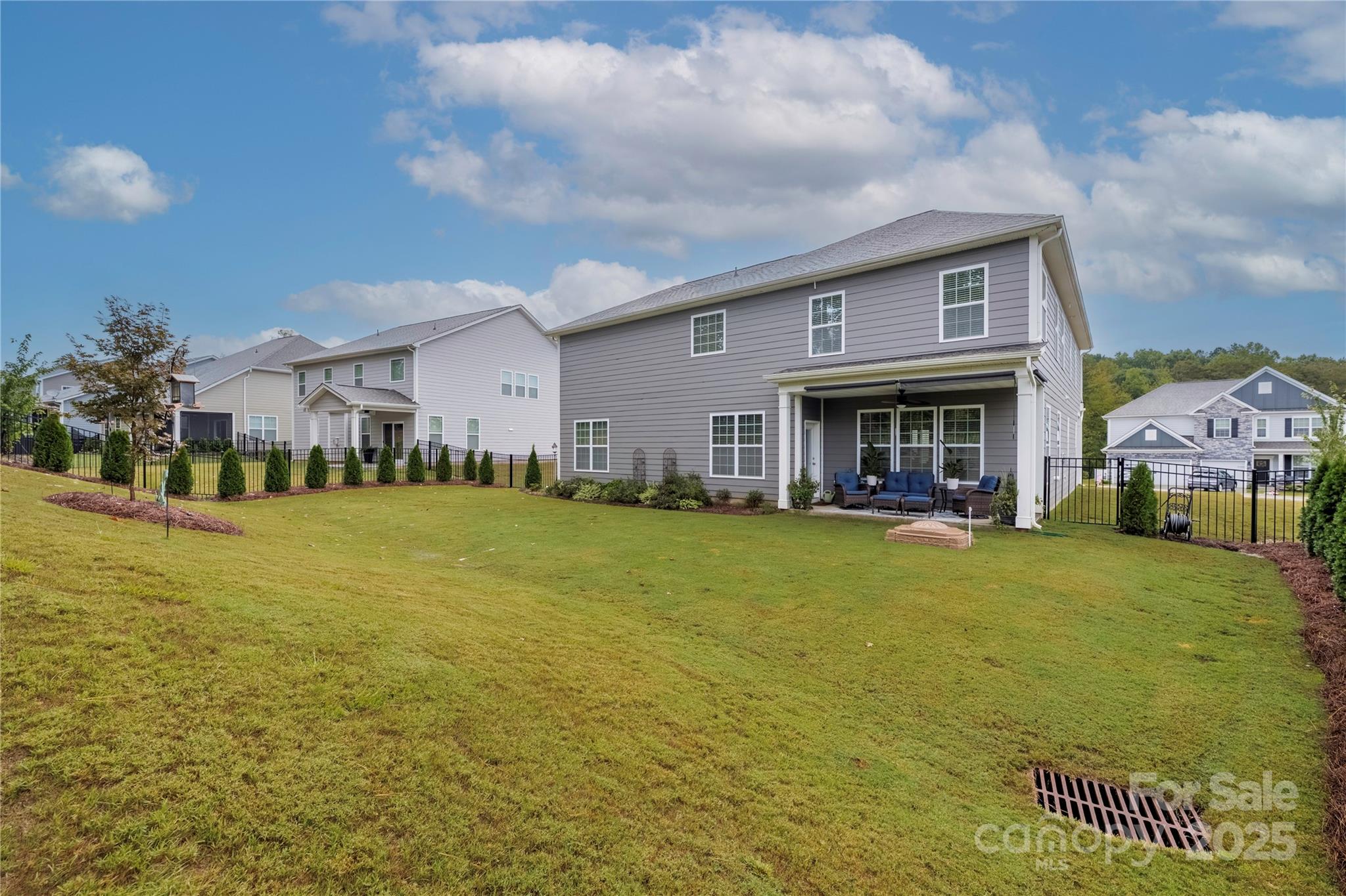 121 Rhuidean Court Troutman, NC 28166 - Photo 42 of 44 a front view of house with yard and lake view