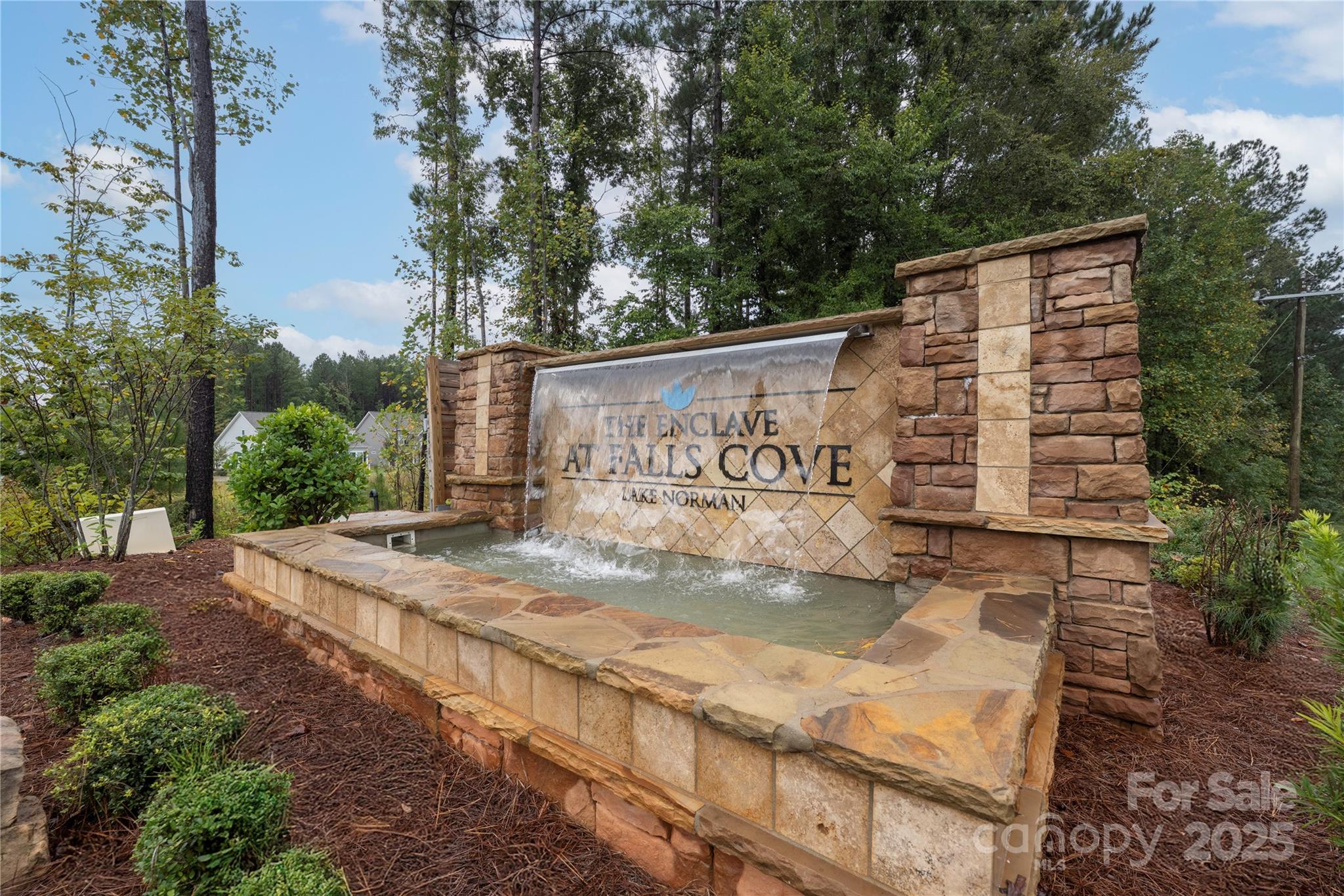 121 Rhuidean Court Troutman, NC 28166 - Photo 44 of 44 a sign on the side of a building