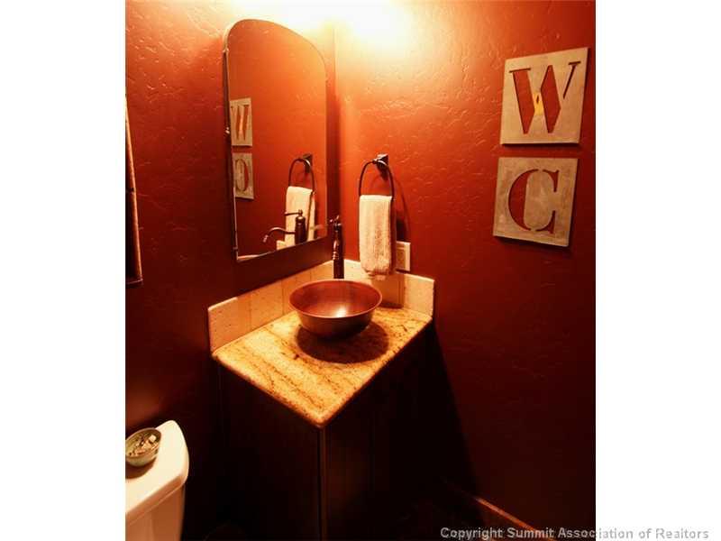 75 Uncle Sam Lode Road Breckenridge, CO 80424 - Photo 8 of 16 a bathroom with a sink and a mirror