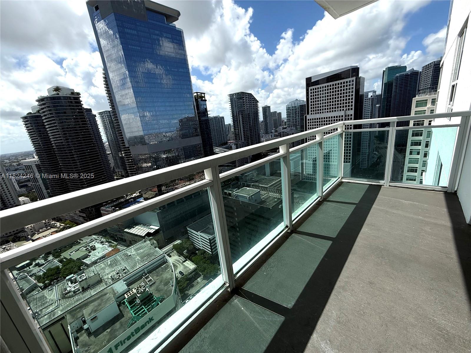 951 Brickell Avenue, Unit 3703 Miami, FL 33131 - Photo 13 of 34 a view of balcony with furniture