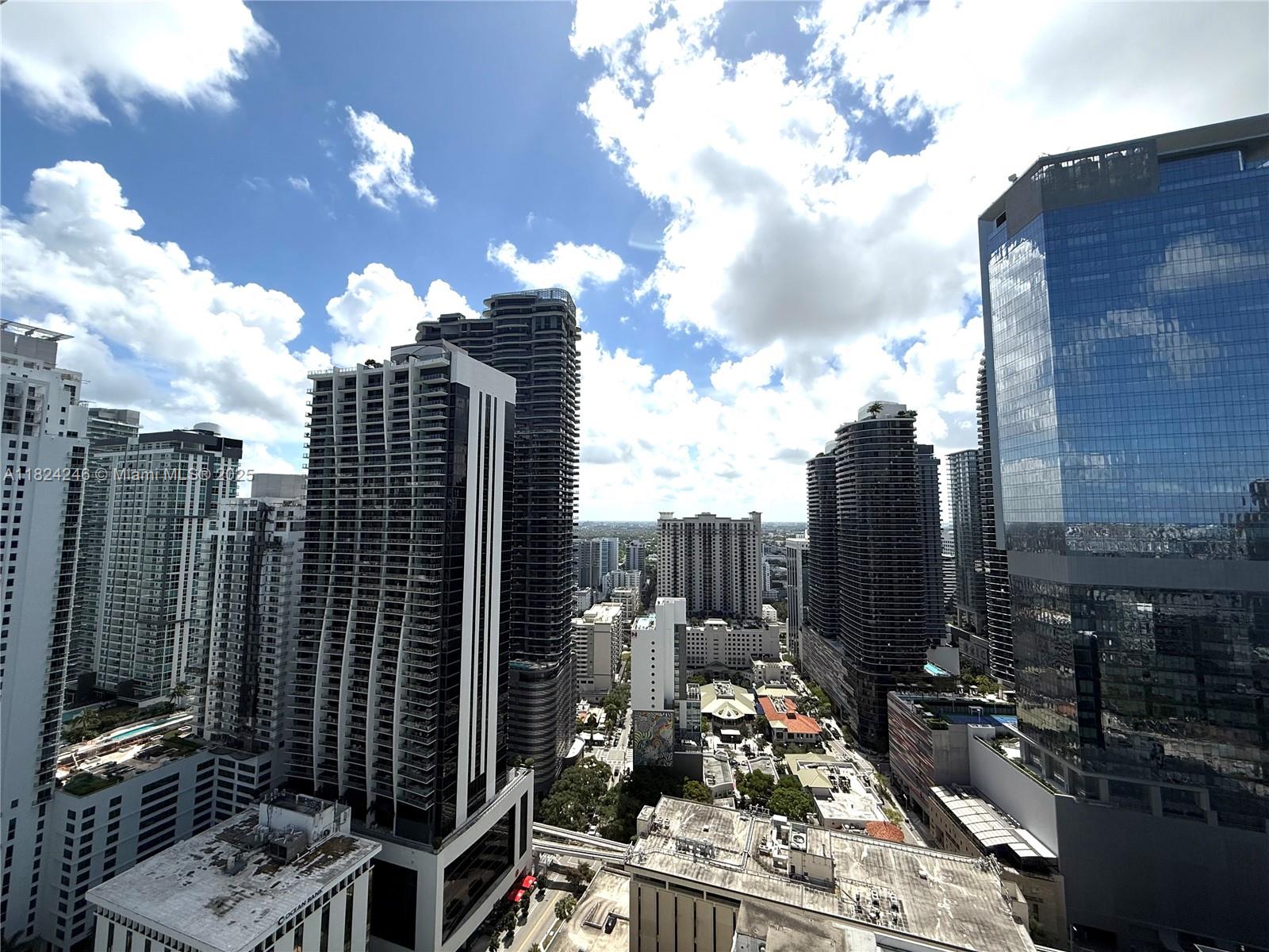 951 Brickell Avenue, Unit 3703 Miami, FL 33131 - Photo 17 of 34 a view of a city with tall buildings