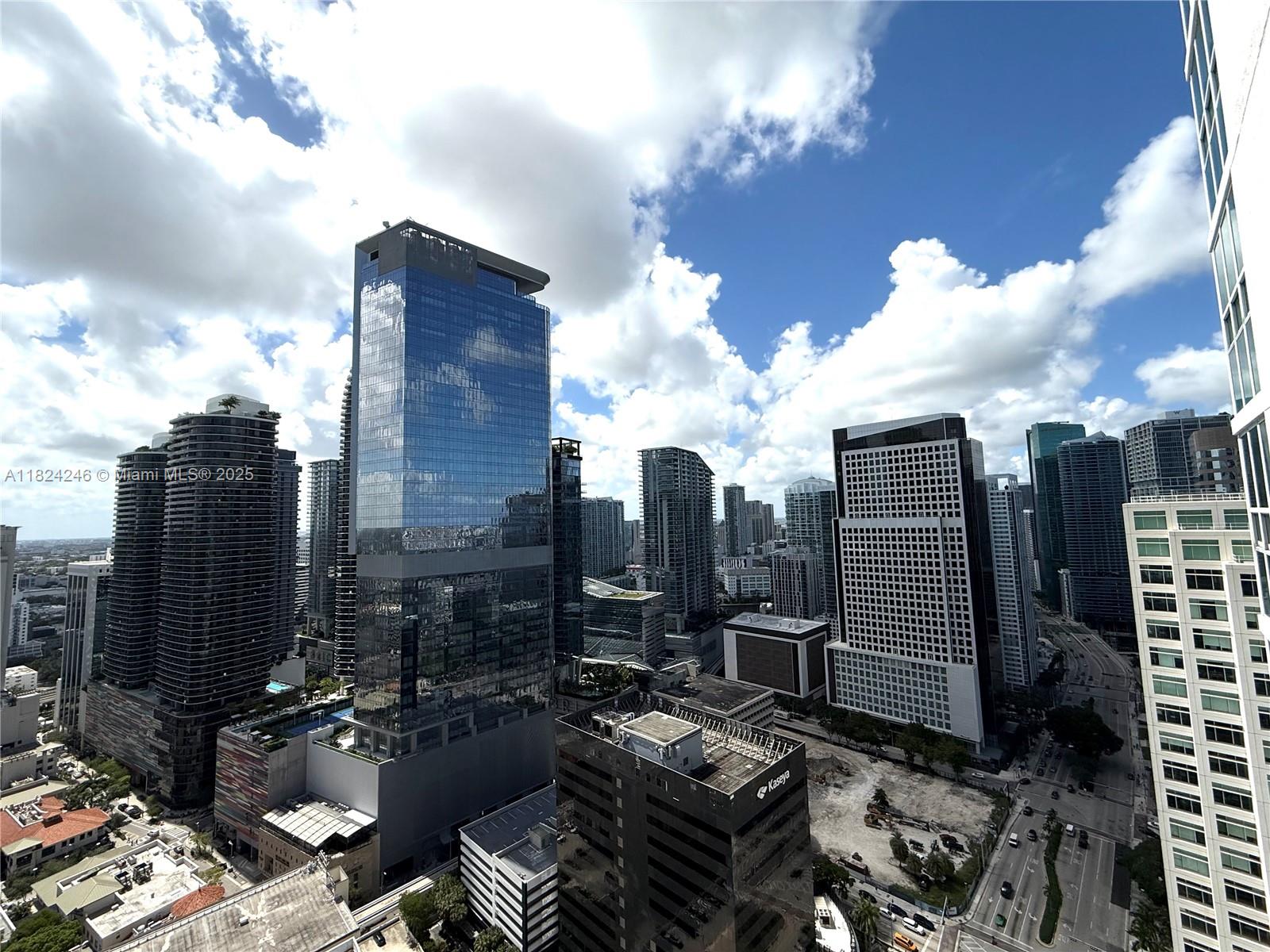951 Brickell Avenue, Unit 3703 Miami, FL 33131 - Photo 18 of 34 a view of a city with tall buildings