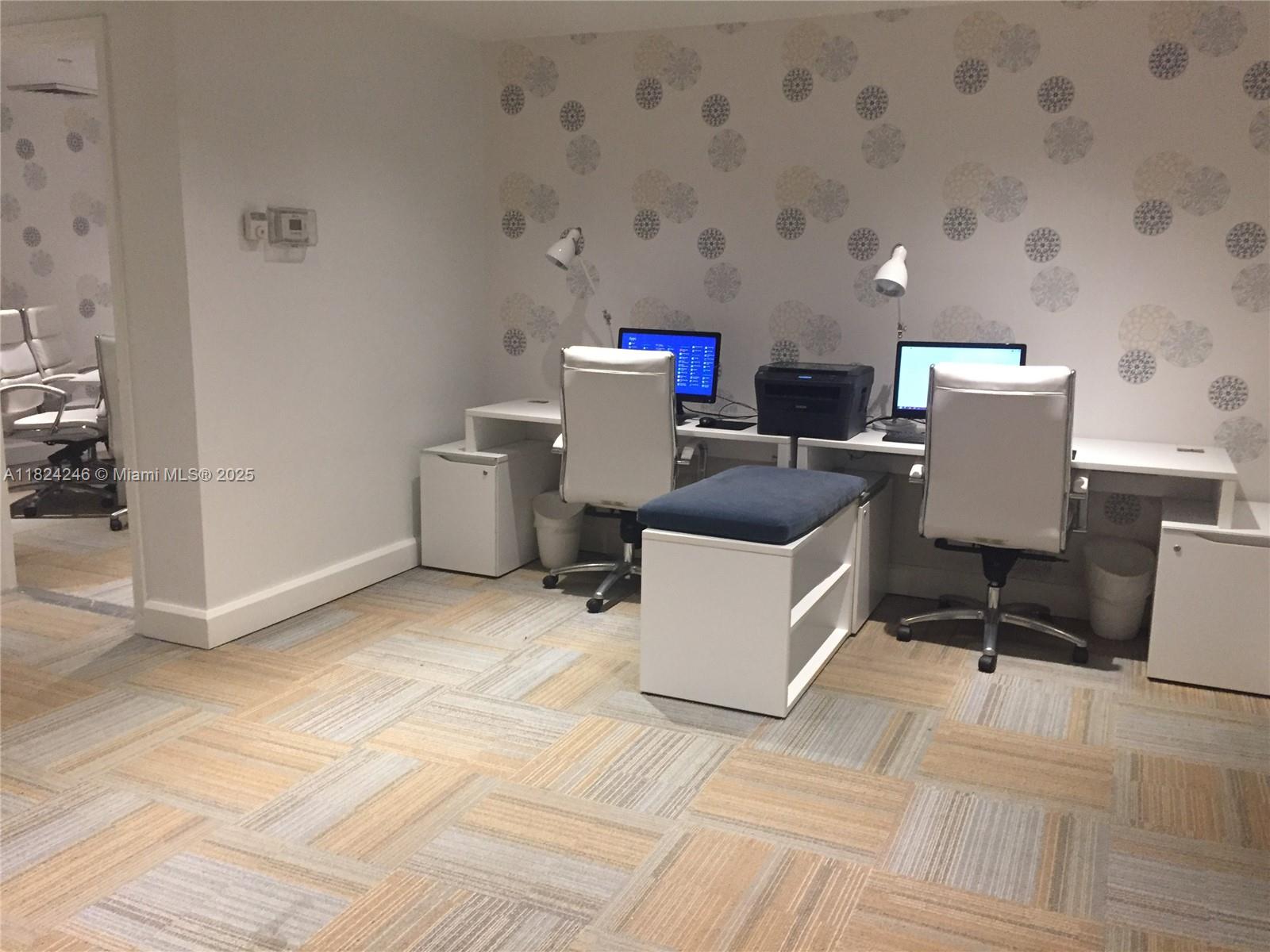 951 Brickell Avenue, Unit 3703 Miami, FL 33131 - Photo 25 of 34 a workspace with furniture