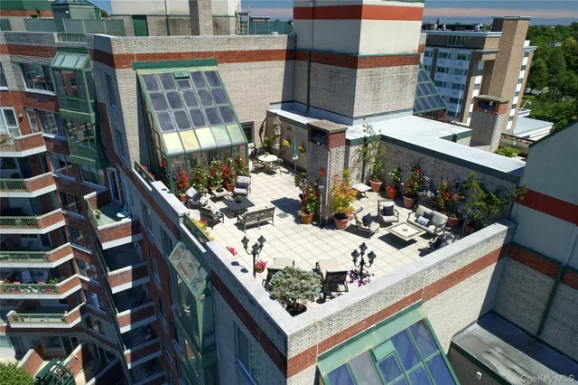 a view of balcony with wooden floor