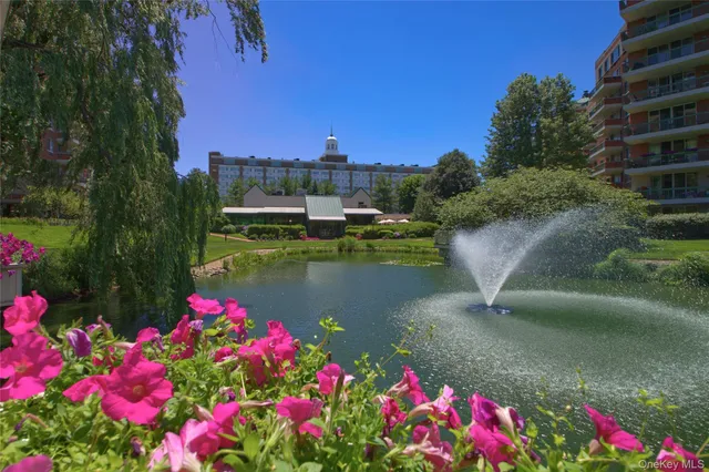 a view of a lake with a building in the background
