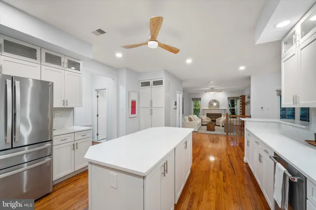 a view of a chairs and table in the balcony