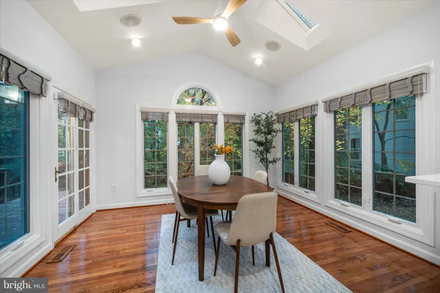 a workspace with furniture and window