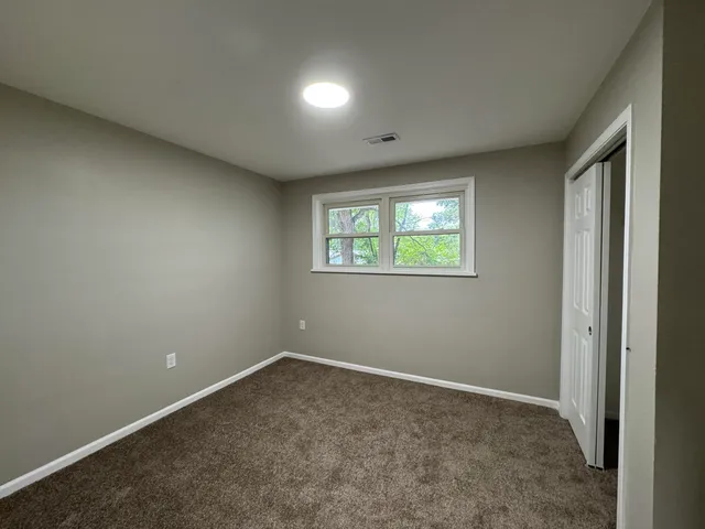 an empty room with windows