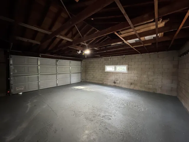 a house with trees in the background