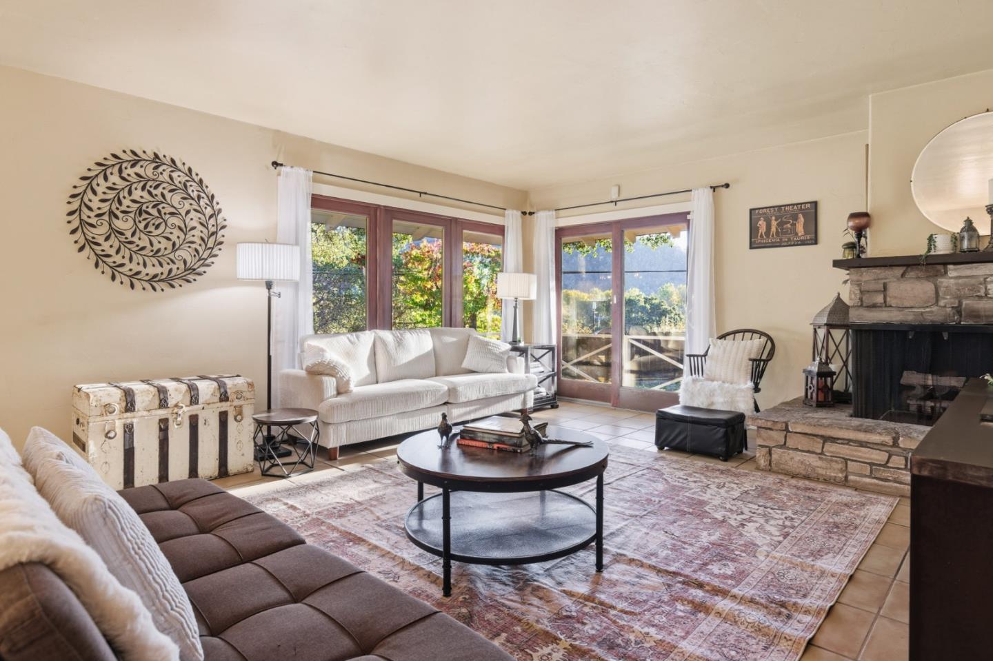 9805 Carmel Valley Road Carmel, CA 93923 - Photo 12 of 35 a living room with furniture and a large window