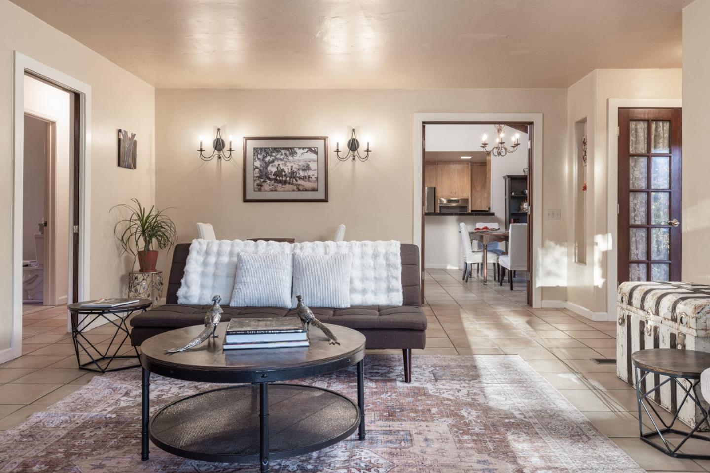 9805 Carmel Valley Road Carmel, CA 93923 - Photo 13 of 35 a living room with furniture and wooden floor