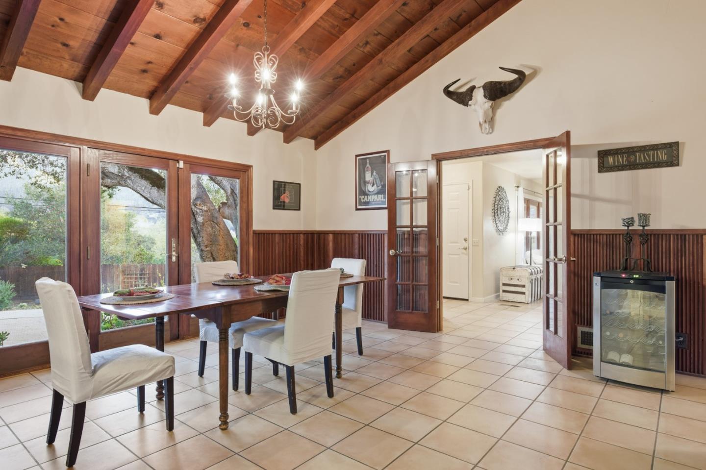9805 Carmel Valley Road Carmel, CA 93923 - Photo 14 of 35 a dining room with furniture and window