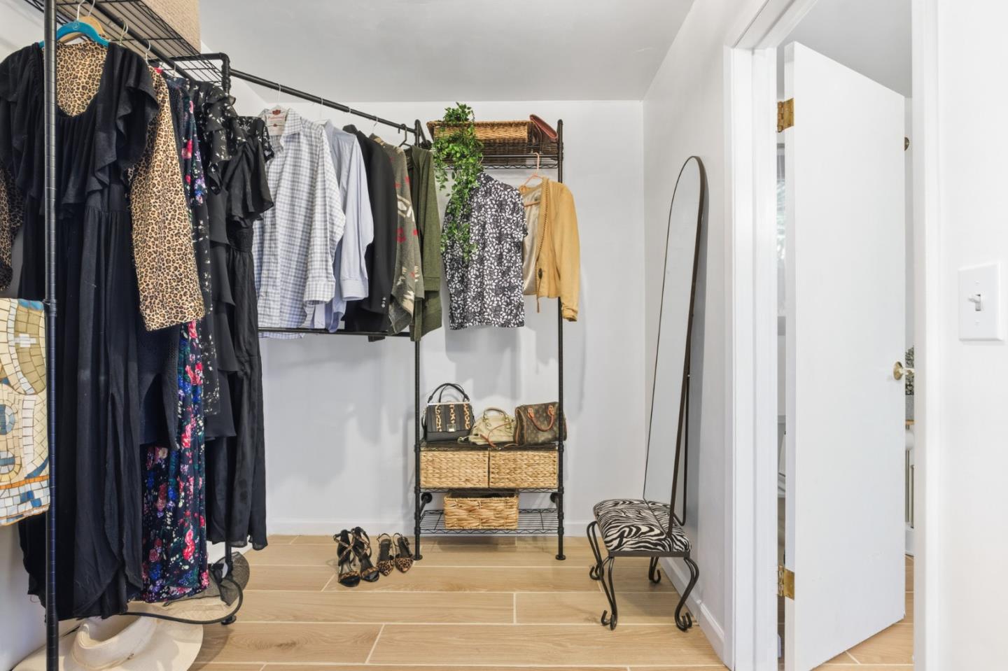 9805 Carmel Valley Road Carmel, CA 93923 - Photo 24 of 35 a view of walk in closet with clothes and shoes
