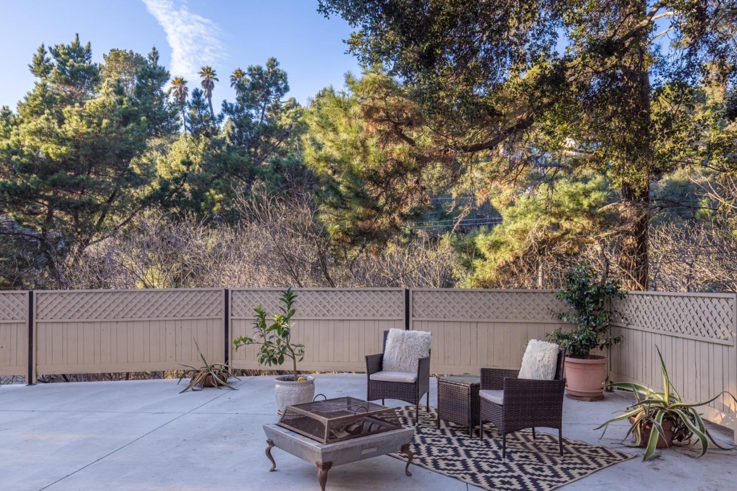 9805 Carmel Valley Road Carmel, CA 93923 - Photo 28 of 35 an outdoor living area with furniture and a potted plant