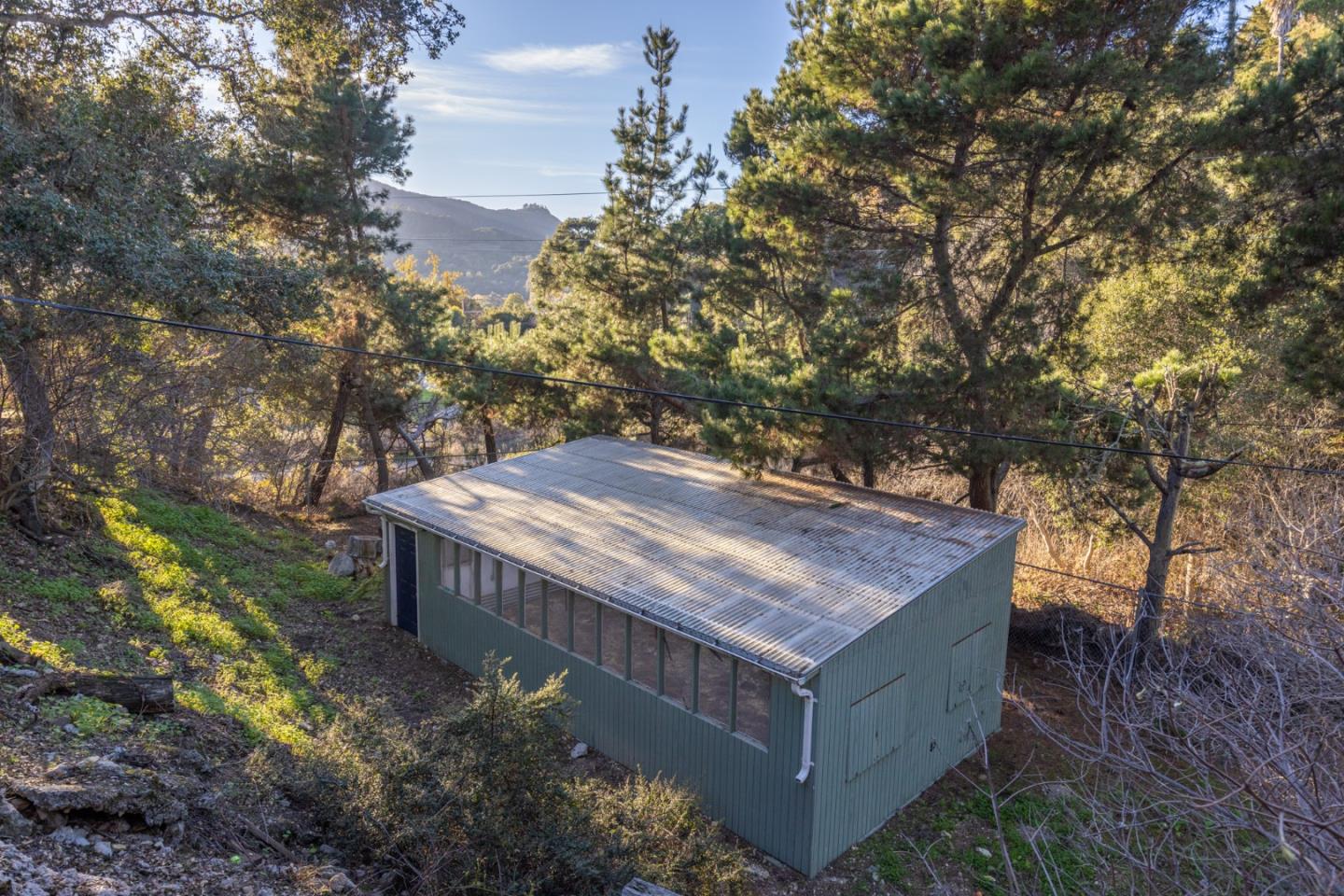 9805 Carmel Valley Road Carmel, CA 93923 - Photo 30 of 35 a view of a wooden deck and a backyard
