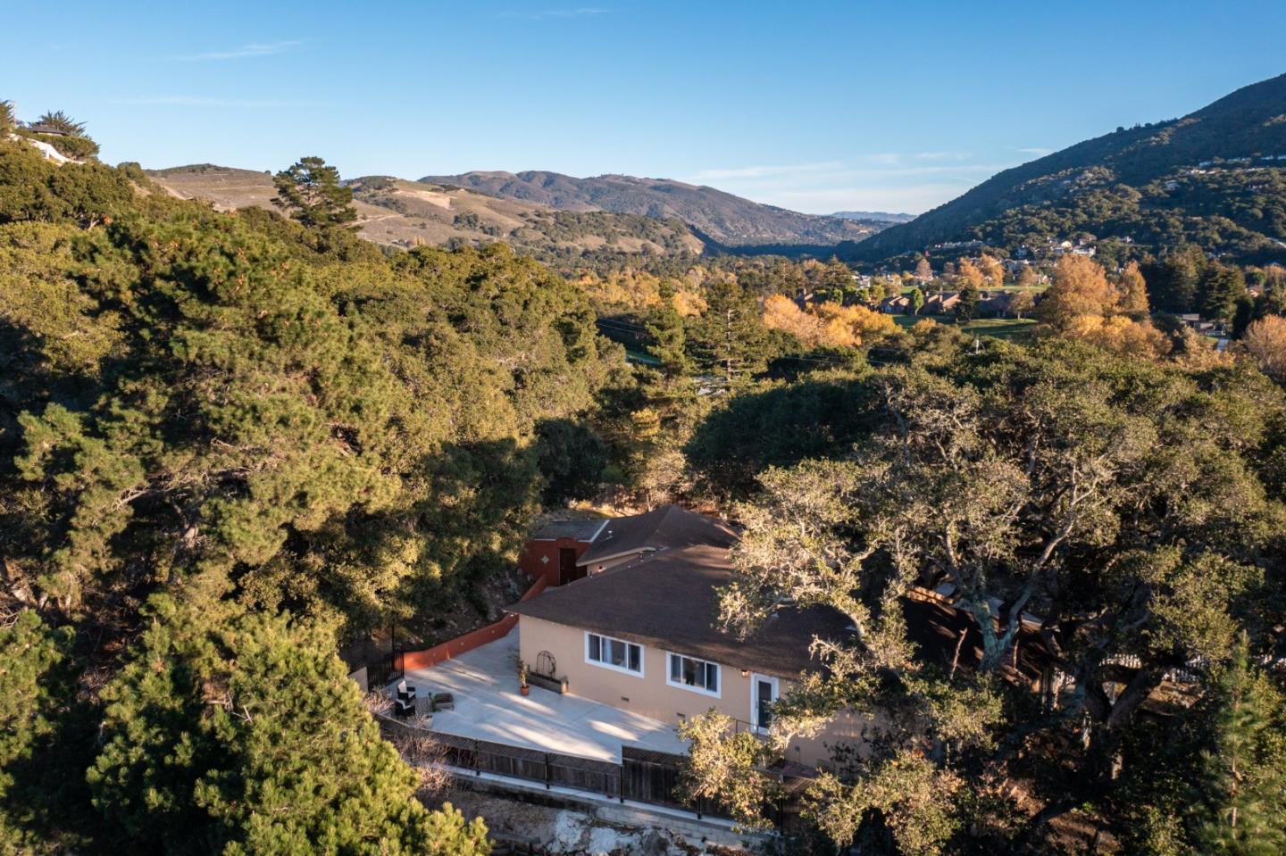 9805 Carmel Valley Road Carmel, CA 93923 - Photo 31 of 35 a view of a houses with a mountain
