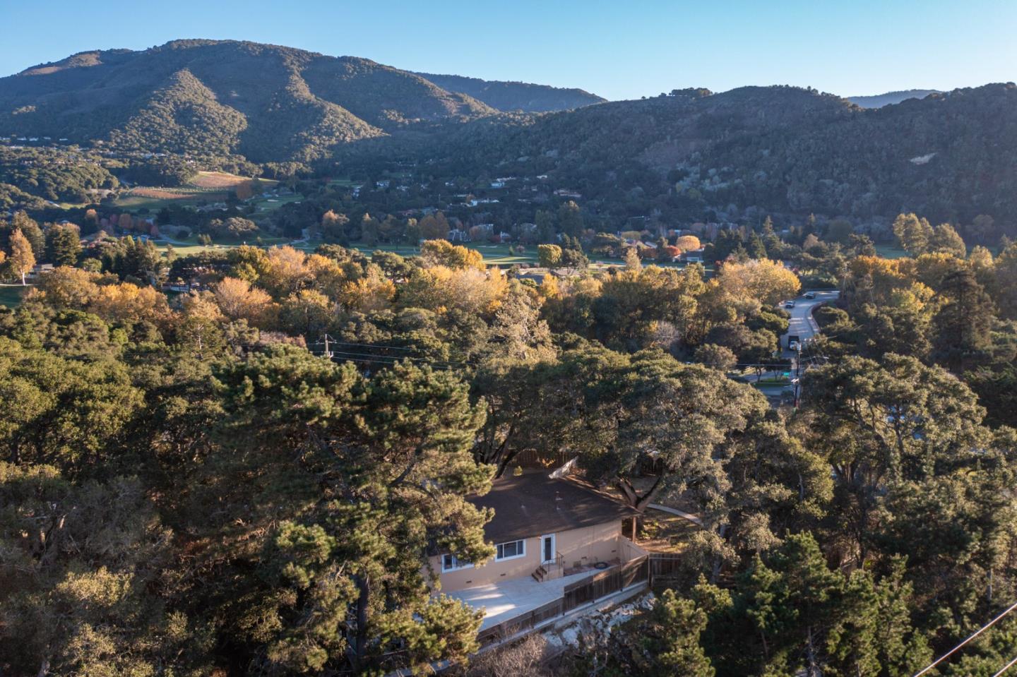 9805 Carmel Valley Road Carmel, CA 93923 - Photo 33 of 35 a view of a town with mountains in the background