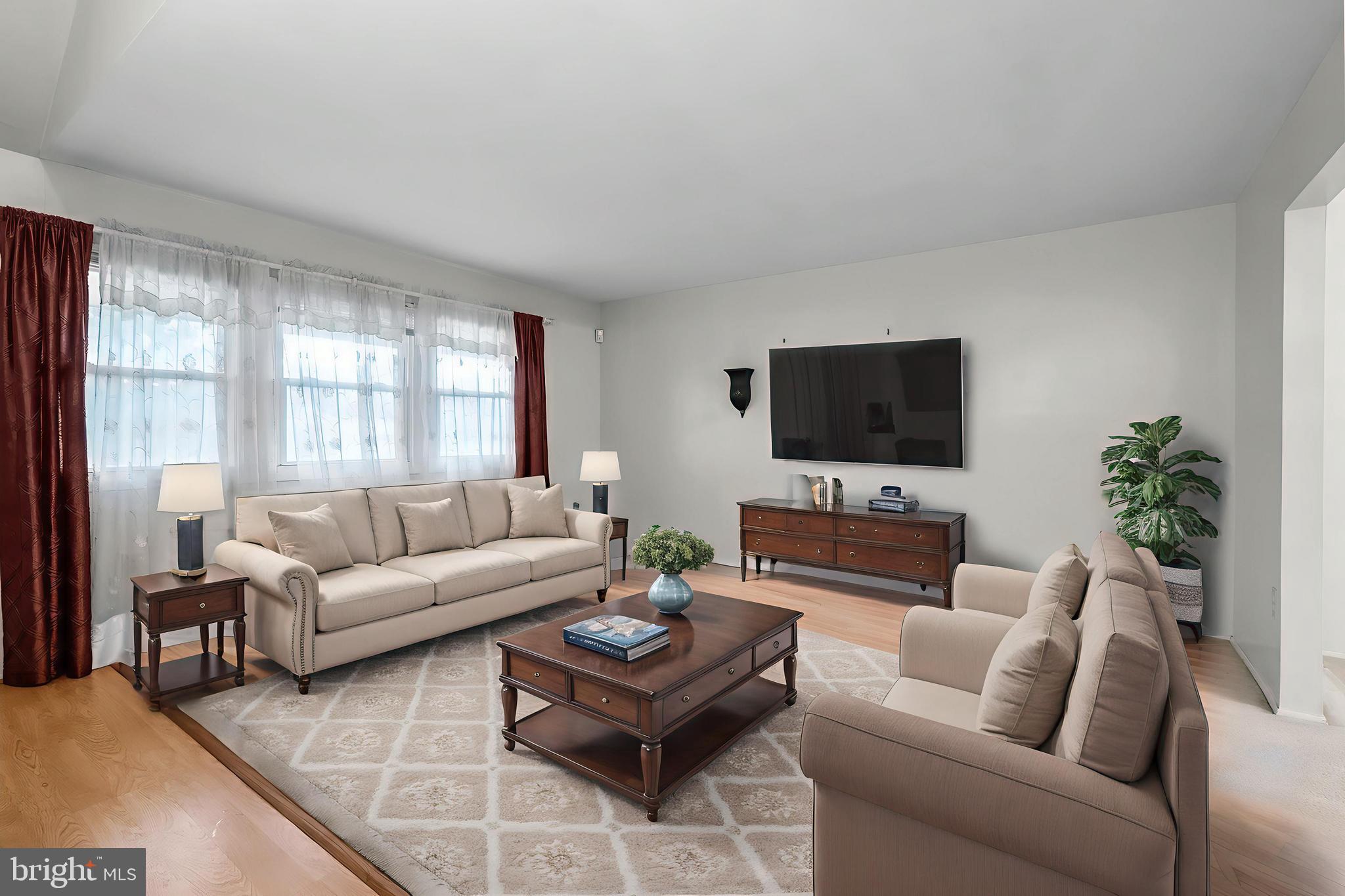 2015 Kennicott Road Baltimore, MD 21244 - Photo 5 of 26 a living room with furniture and a flat screen tv