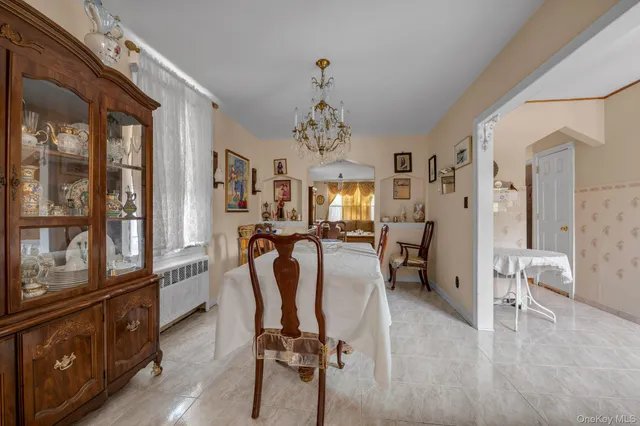 a view of a livingroom with furniture and a window