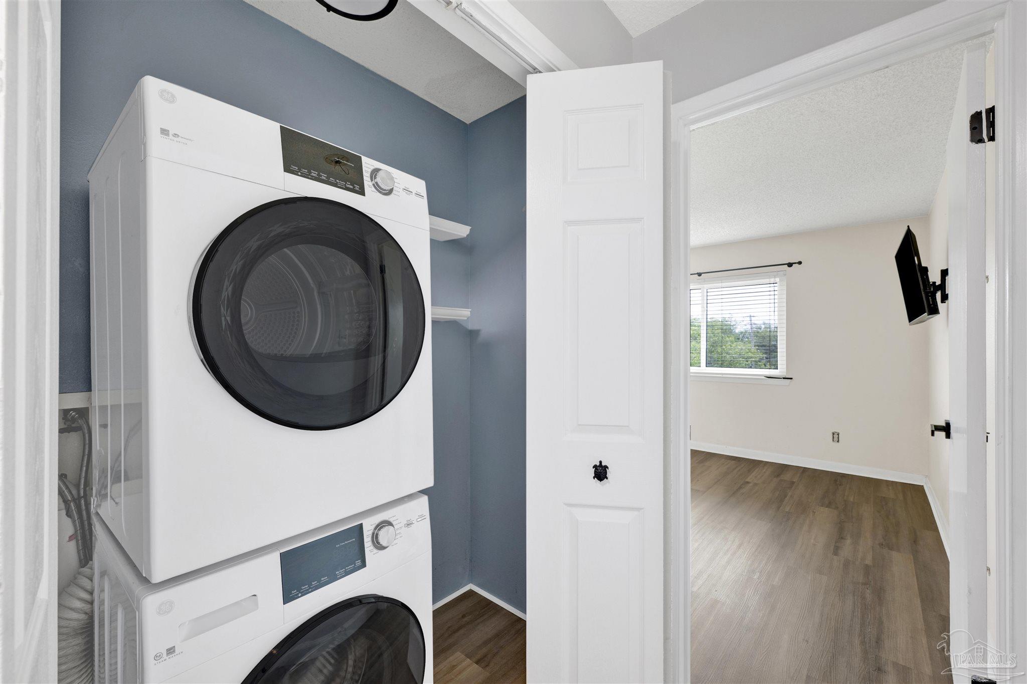 14100 River Road, Unit 334 Perdido Key, FL 32507 - Photo 23 of 35 a utility room with dryer and washer