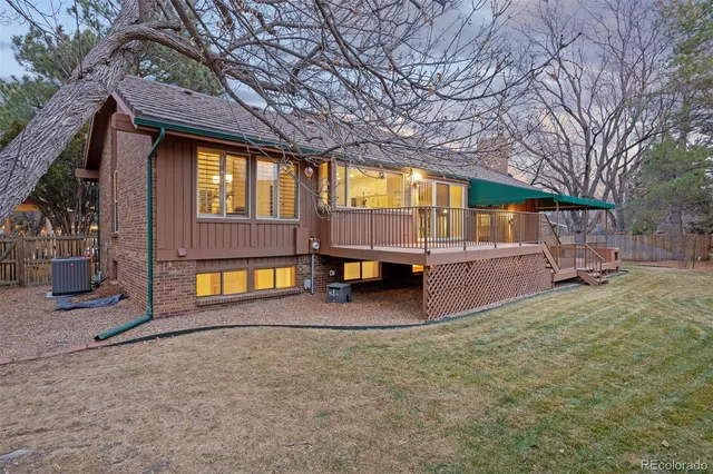 a view of a house with a sink and a yard