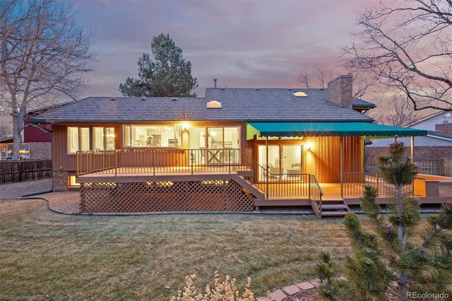 an outdoor space with lounge chair