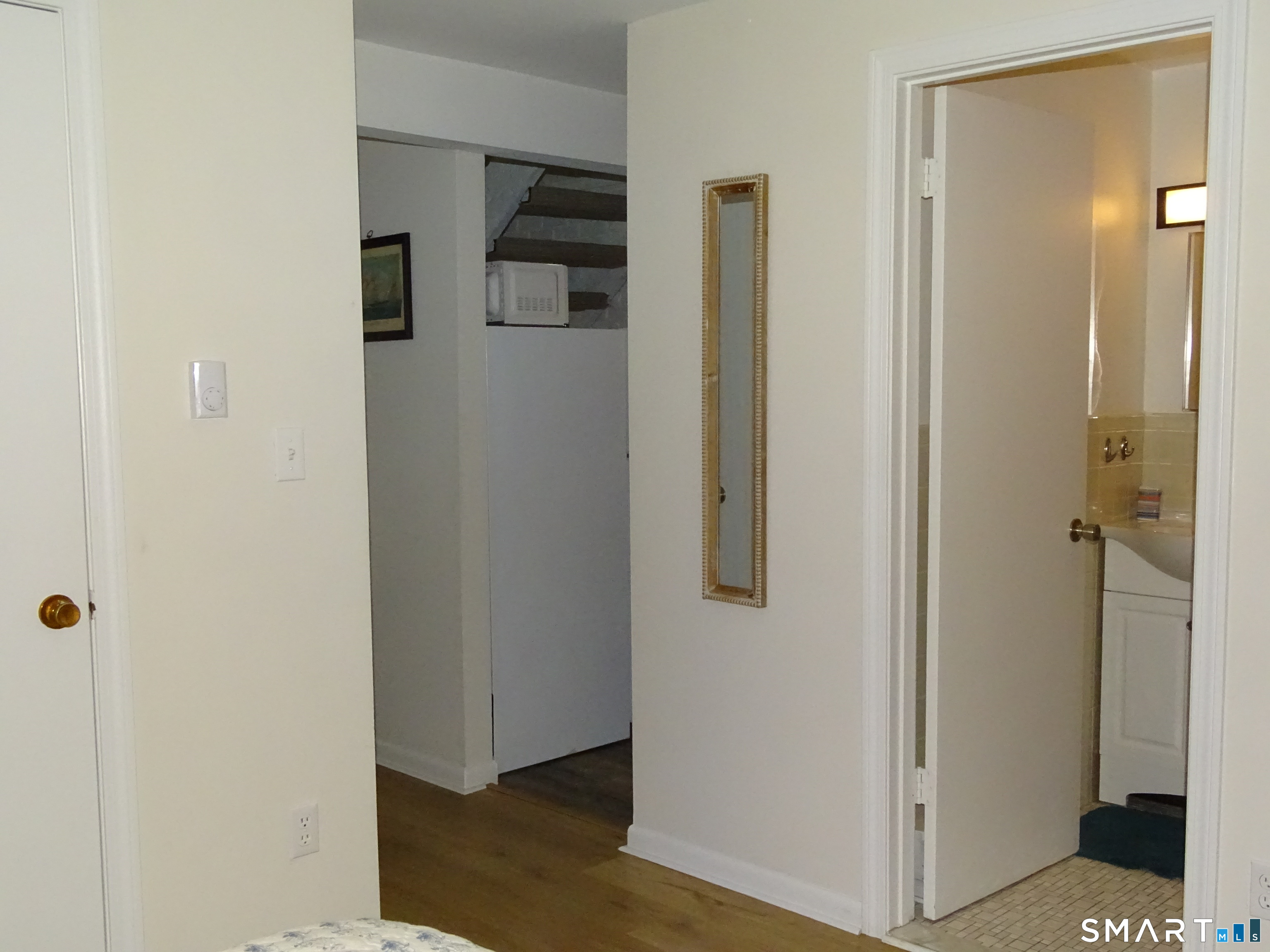 81 Church Street Branford, CT 06405 - Photo 15 of 21 a view of a bathroom with wooden floor