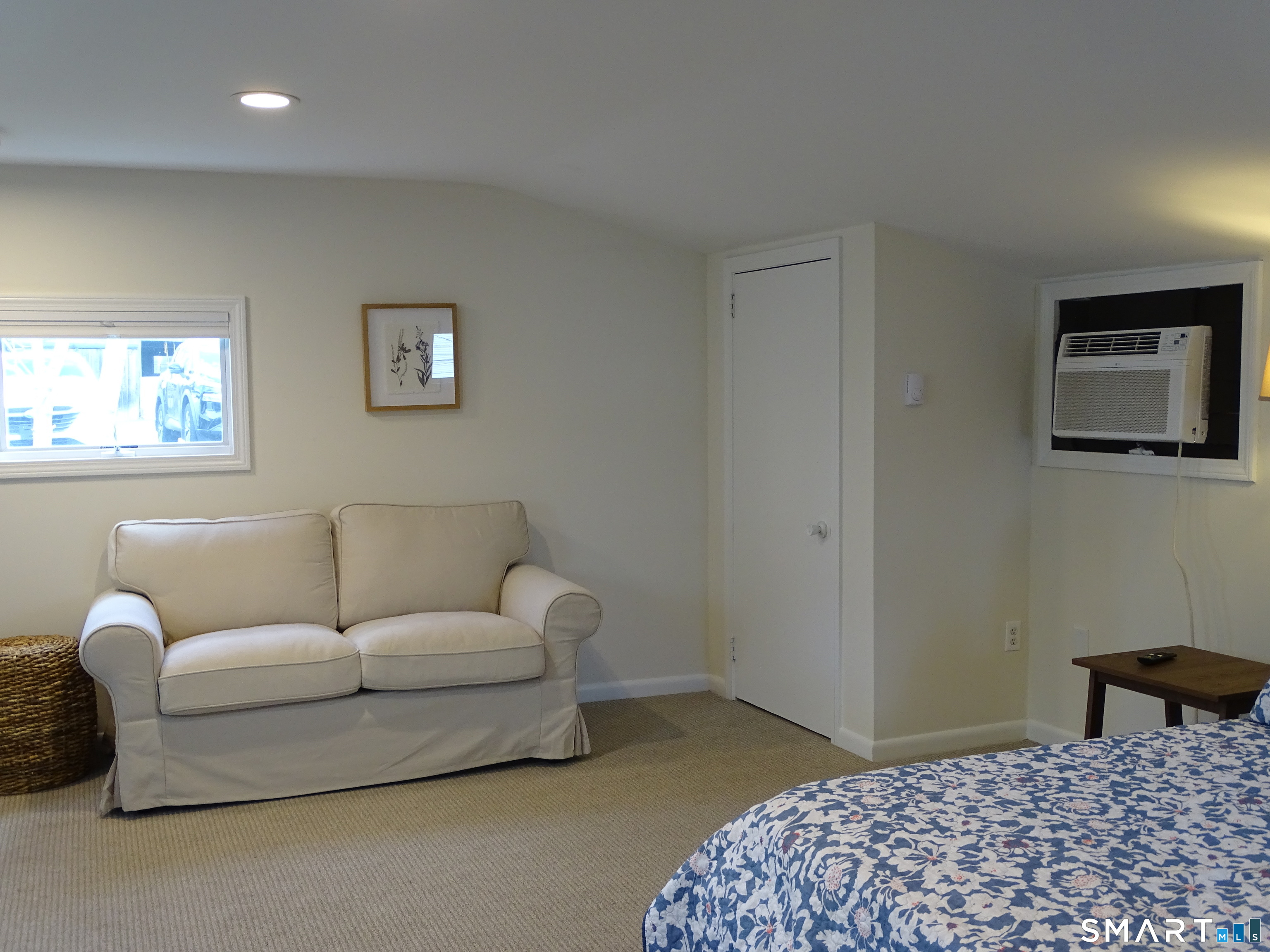 81 Church Street Branford, CT 06405 - Photo 20 of 21 a living room with furniture and a window