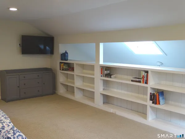 a view of an empty room with empty racks