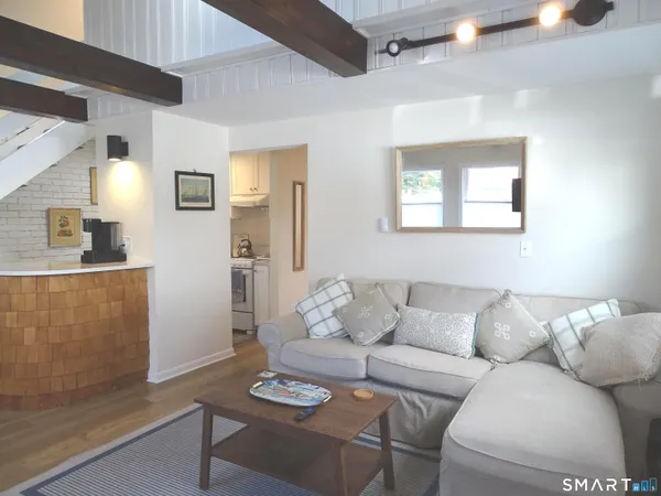 a living room with furniture and a couch