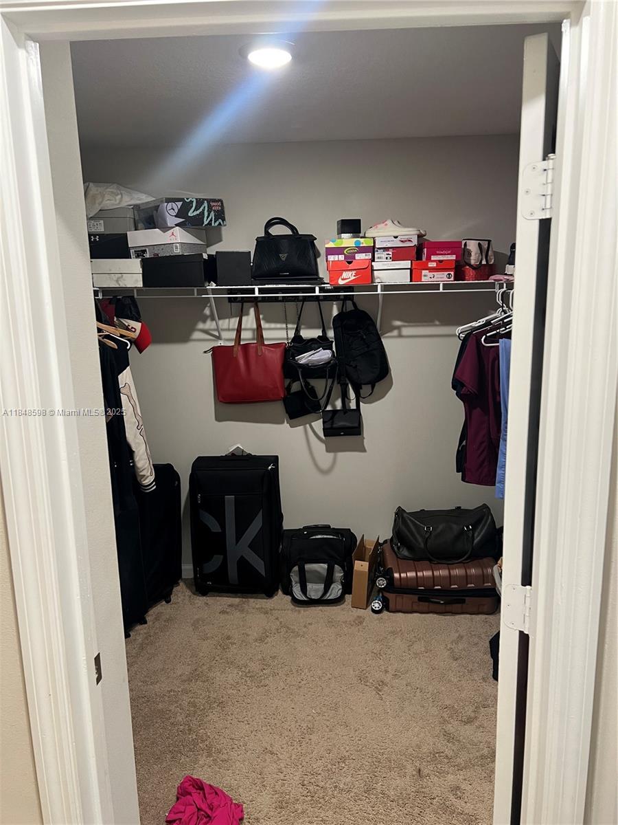 172 Southwest Langfield Avenue Port St. Lucie, FL 34984 - Photo 17 of 24 a room with storage and utility