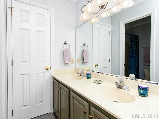365 Gregory Road Salisbury, NC 28147 - Photo 11 of 16 a bathroom with a sink vanity and a mirror