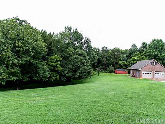 365 Gregory Road Salisbury, NC 28147 - Photo 16 of 16 a backyard of a house with lots of green space