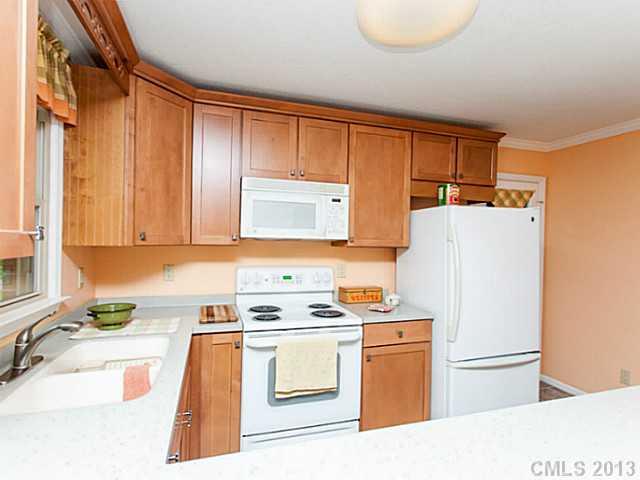 365 Gregory Road Salisbury, NC 28147 - Photo 6 of 16 a kitchen with a refrigerator a stove a sink and cabinets