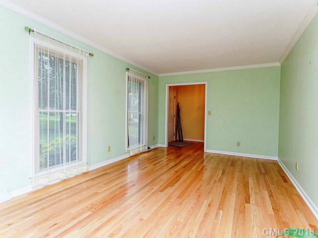 365 Gregory Road Salisbury, NC 28147 - Photo 8 of 16 a view of an empty room with wooden floor and a window