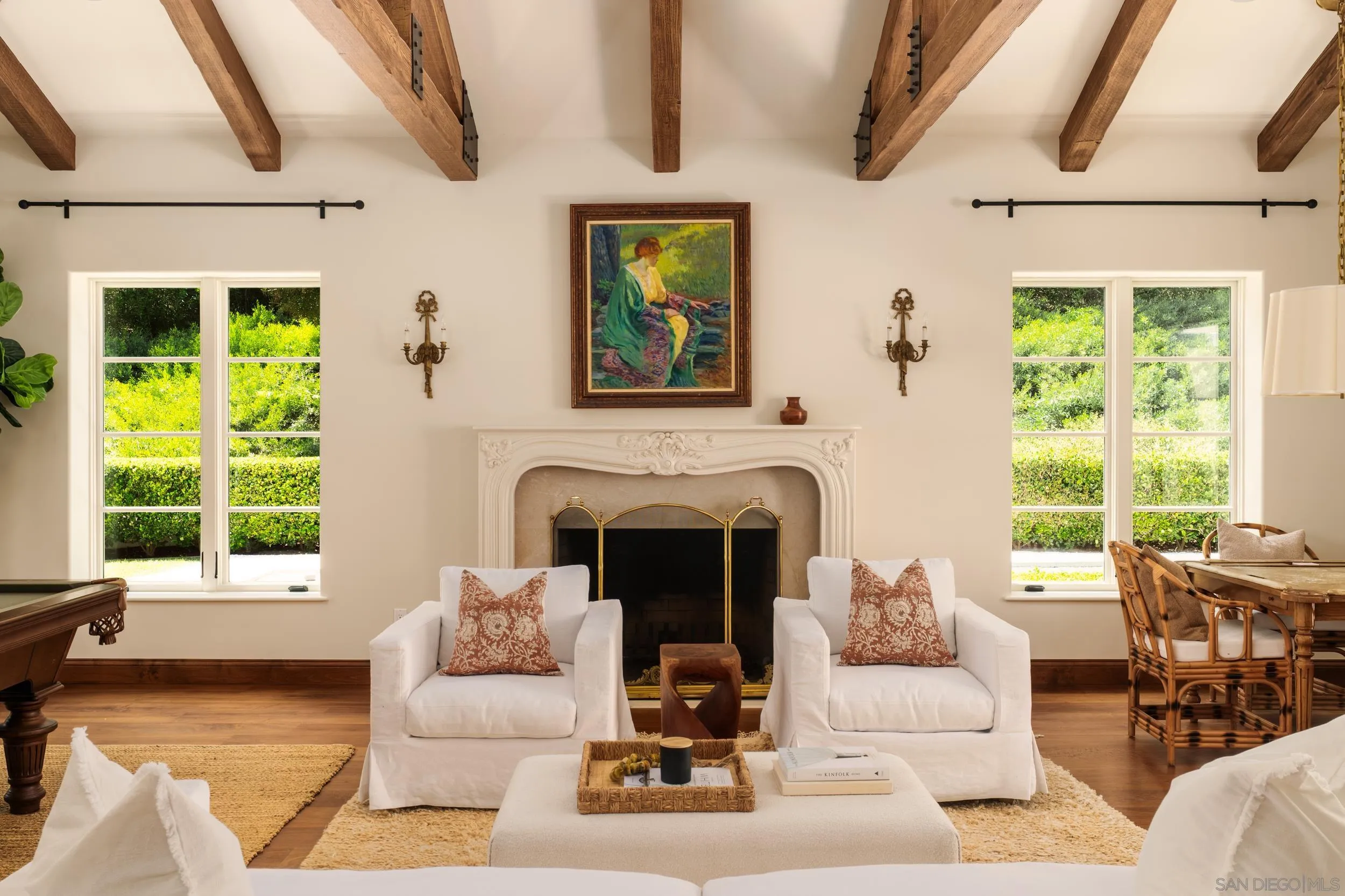 5406 Calzada Del Bosque Rancho Santa Fe, CA 92067 - Photo 6 of 30 a living room with furniture large window and fireplace